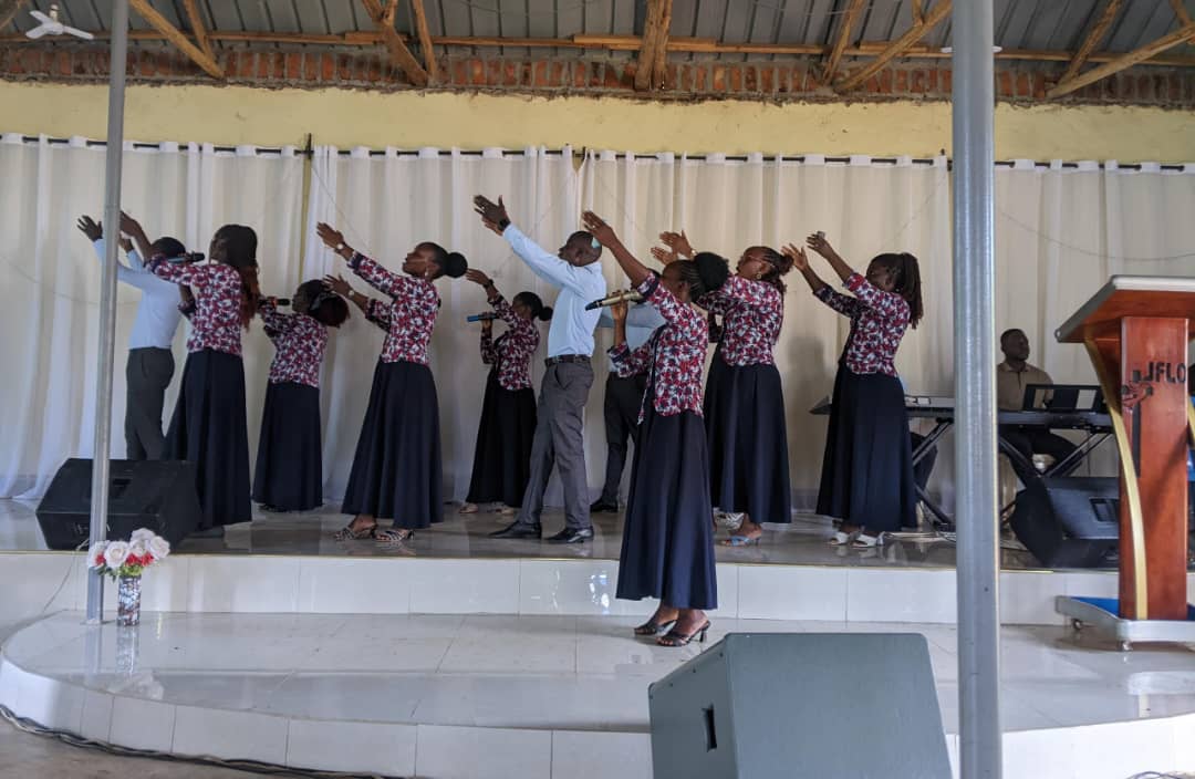 The choir worshipping at Jesus For Life Outreach