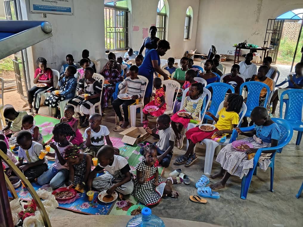 Children eating a meal at the church