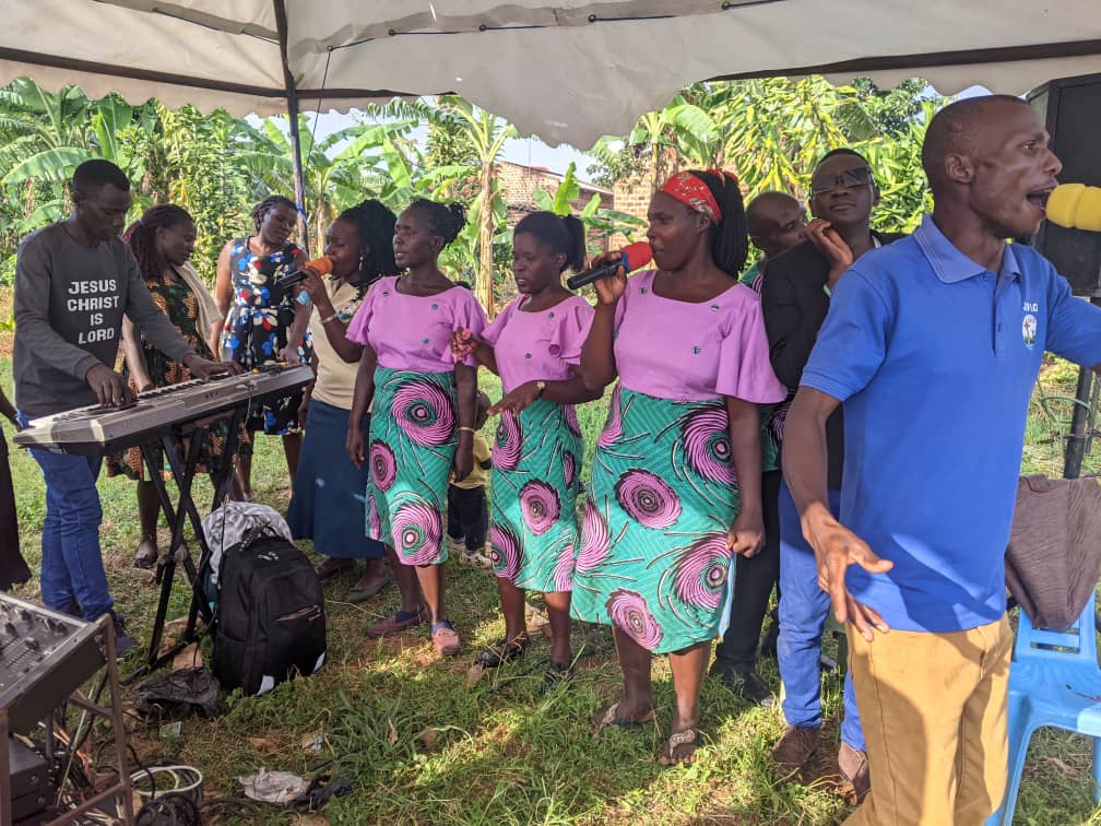 Outdoor singing during a community gathering